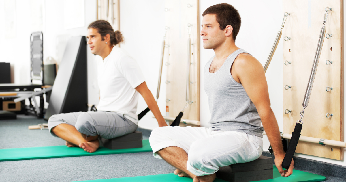 a man doing pilates