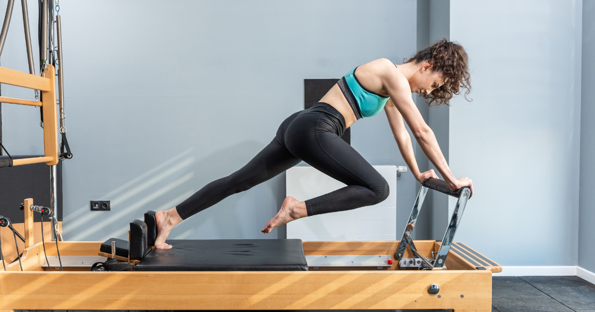 a woman doing pilates