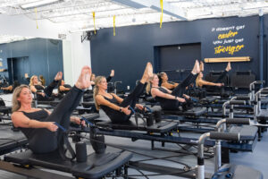 Fitness class doing pilates at Sculp'd in Alexandria.