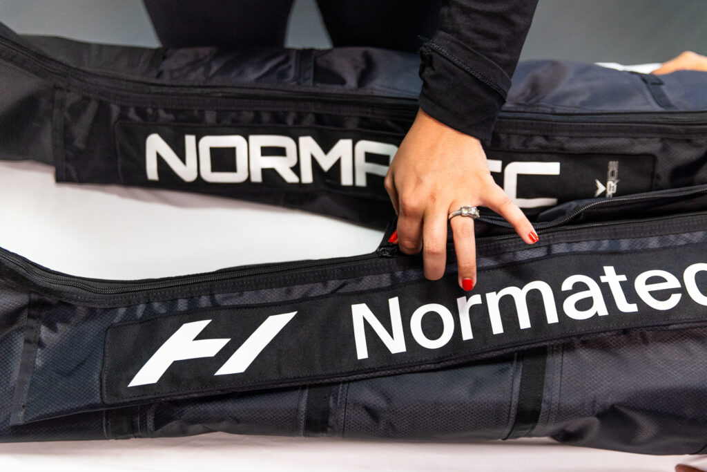 Close up of Normatec compression therapy on a patients legs, showing how the Sculp'd team helps improve circulation near McLean, VA.